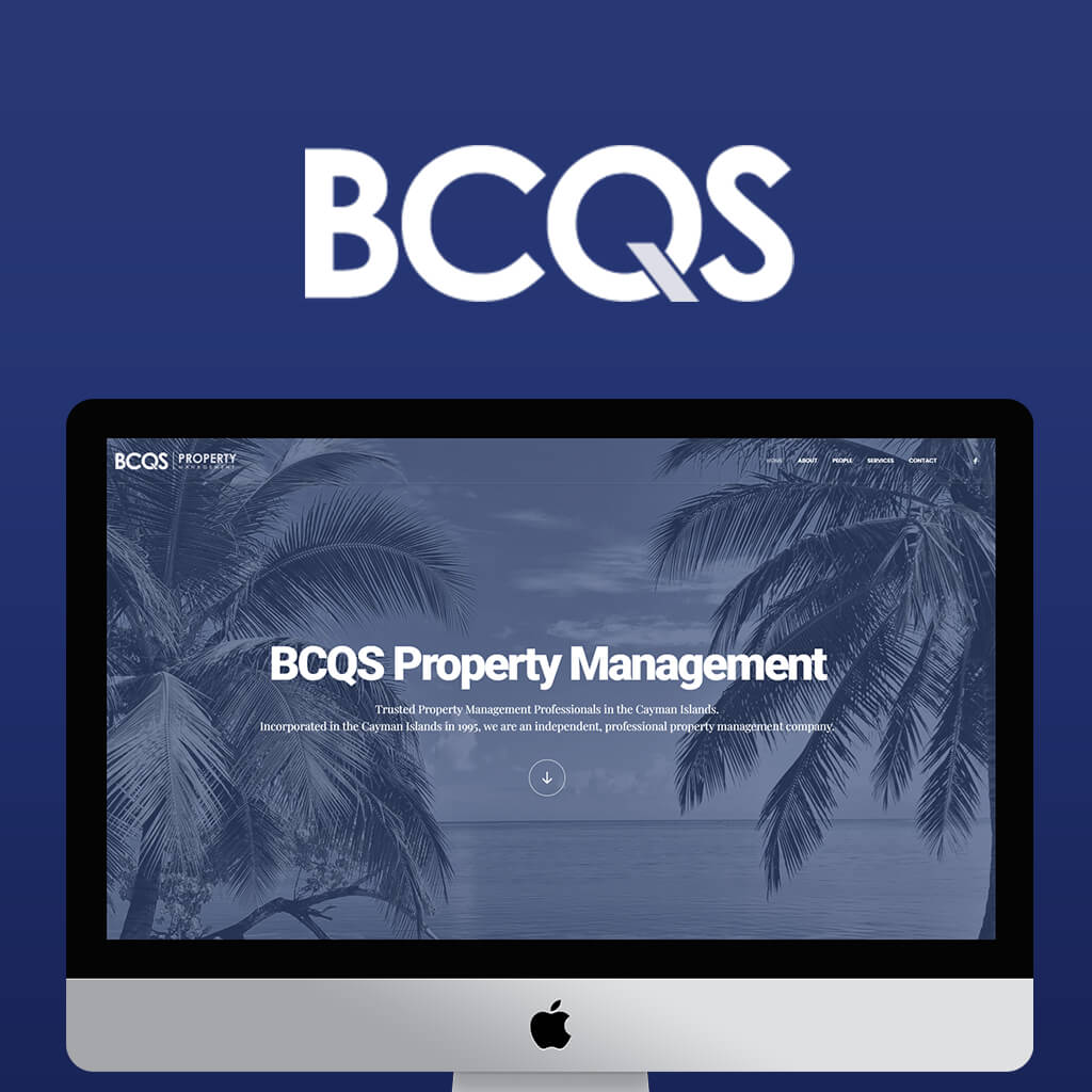 An Apple iMac displaying the BCQS Property Management web homepage